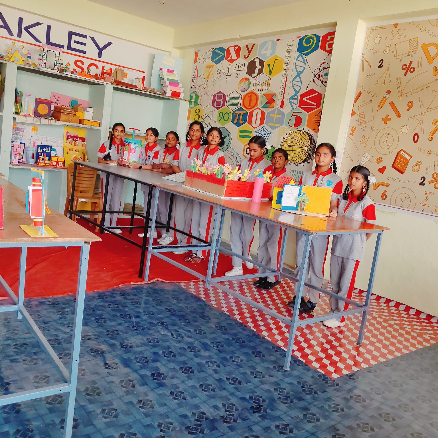 Students presenting handmade classroom projects