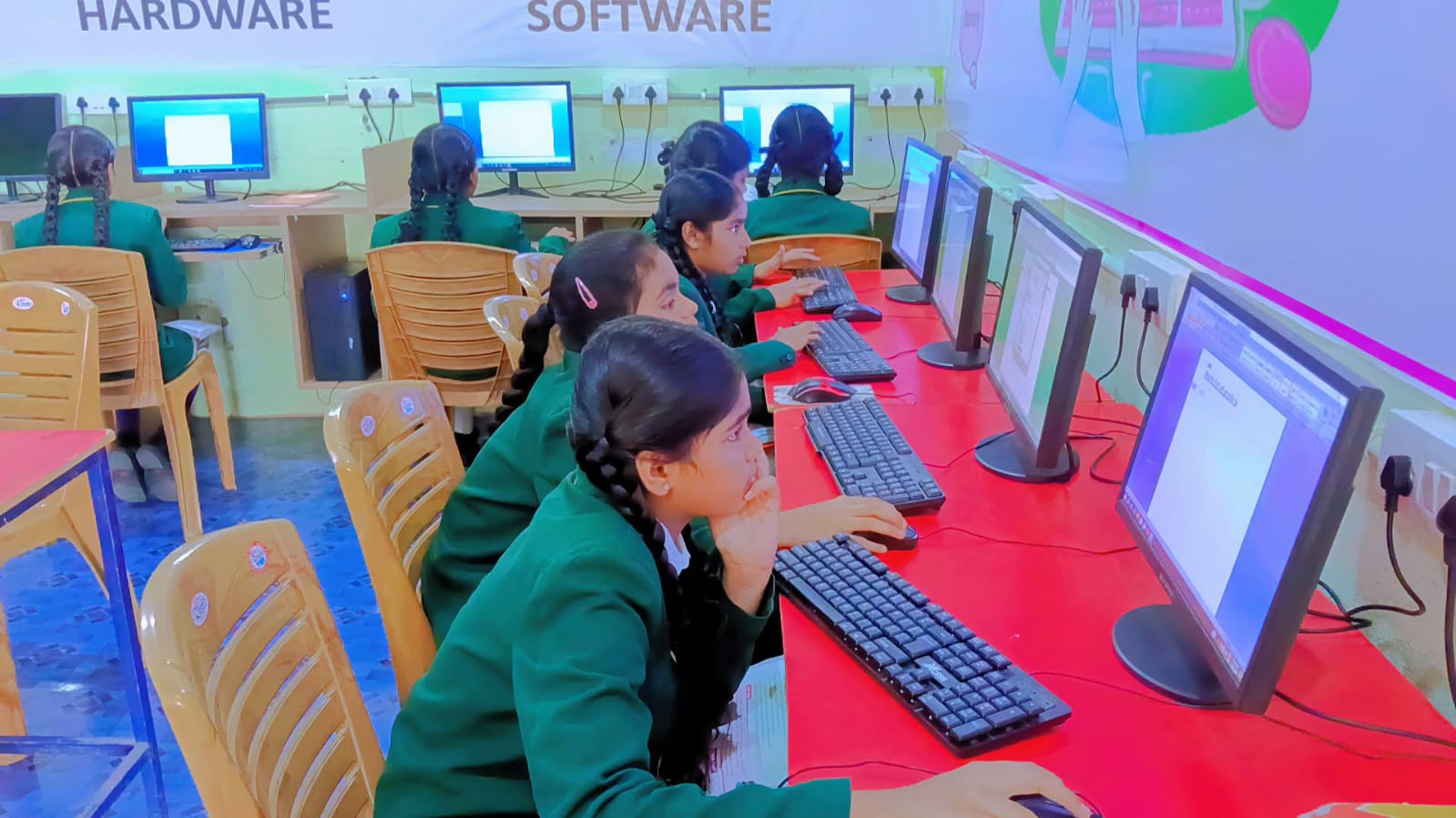 Students using desktop computers in the computer lab