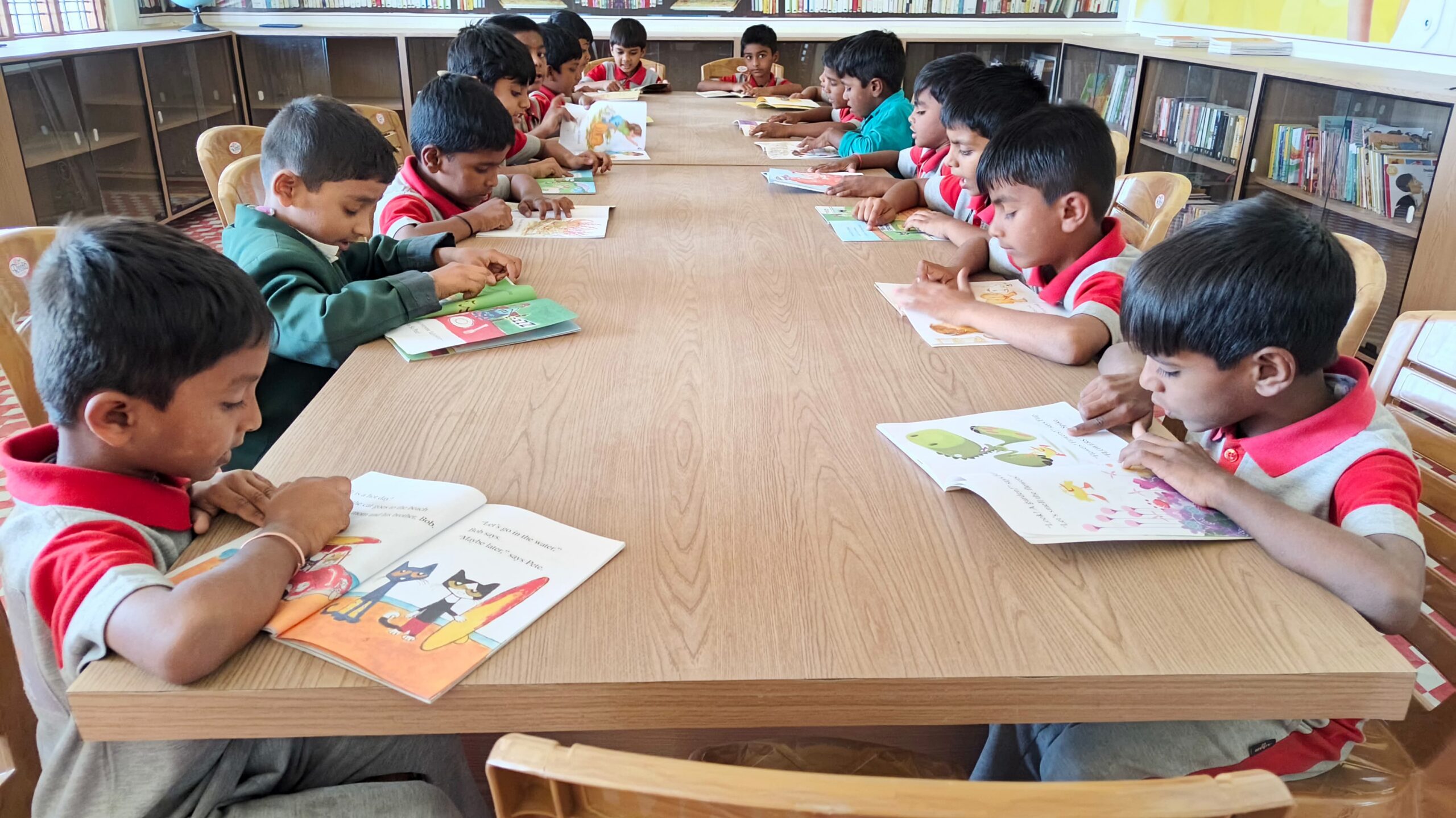 Oakley School Cherial students reading together in the library